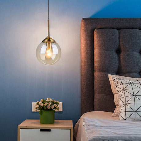 Brass Bedside Pendant Light: Postmodern Blown Glass Sphere | 1-Bulb Hanging Ceiling Fixture Clear