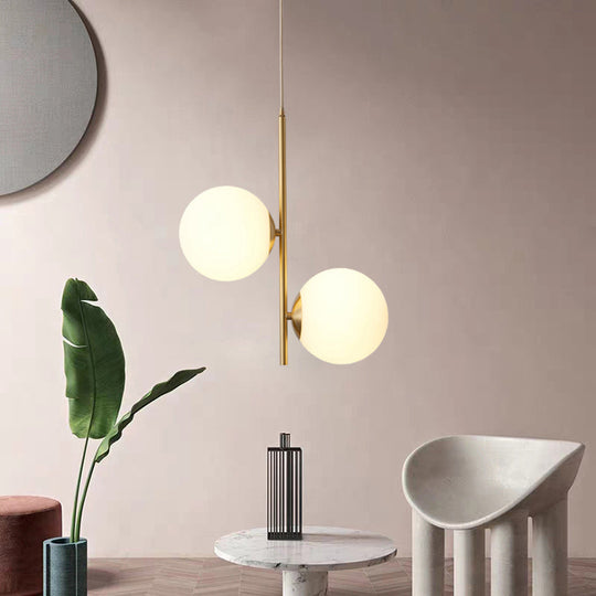 Minimalist Gold Suspension Chandelier: Opaque Glass Spherical 2-Head Light For Dining Room