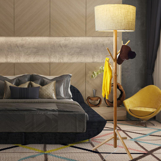 Minimalist Flaxen Drum Stand Up Lamp - Wooden Tripod 1-Light Fabric Floor Light With Coat Rack