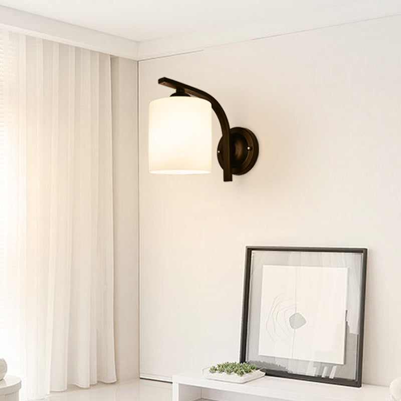 Vintage Cylindrical White Glass Wall Sconce With Curved Black Arm
