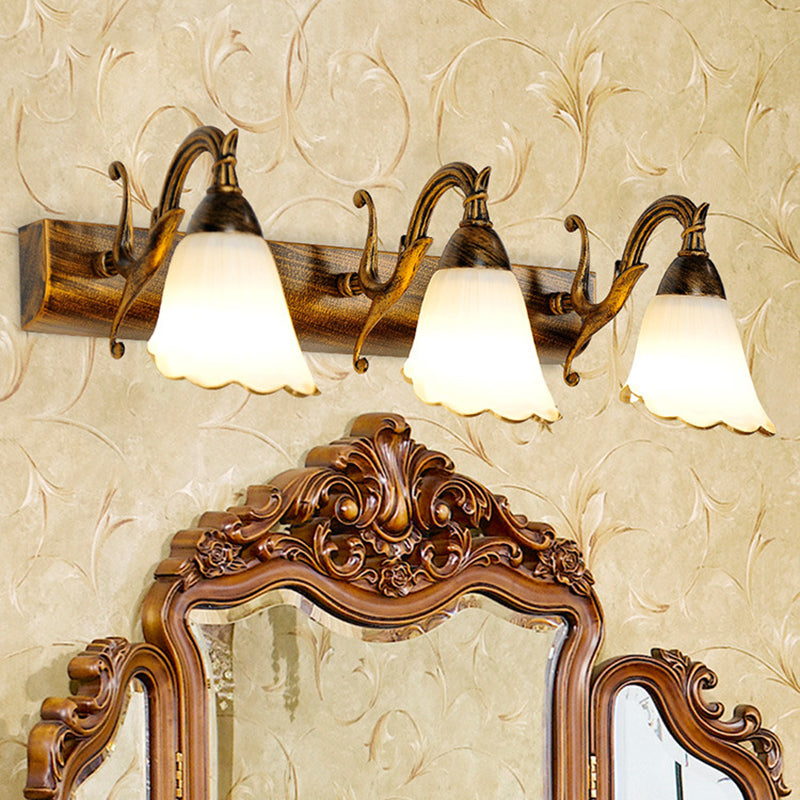 Bronze Wall Lamp With Country Flower Shade And White Rid Glass For Vanity Lighting
