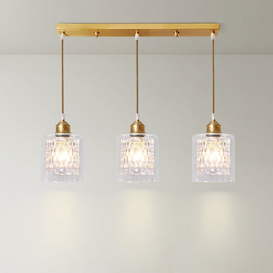 Modern Brass Cylinder Pendant Light With Prismatic Glass Shade - 3 Lights Linear/Round Canopy