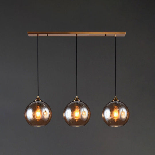 Contemporary Blown Glass Sphere Pendant Lights For Bedrooms Amber / Linear