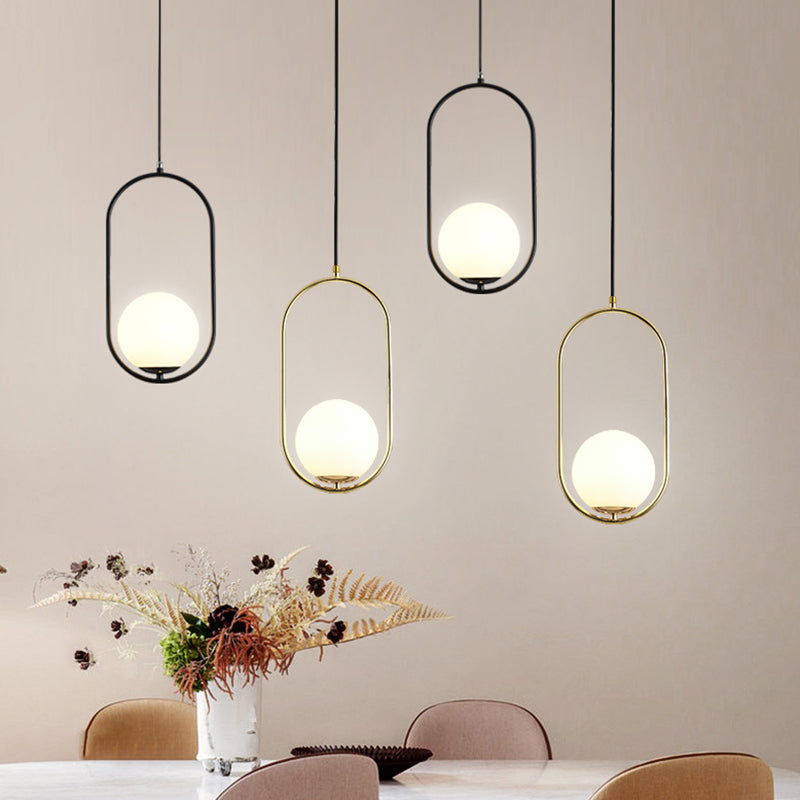 White Glass Pendant Light With Mid-Century Globe Design And Metal Ring