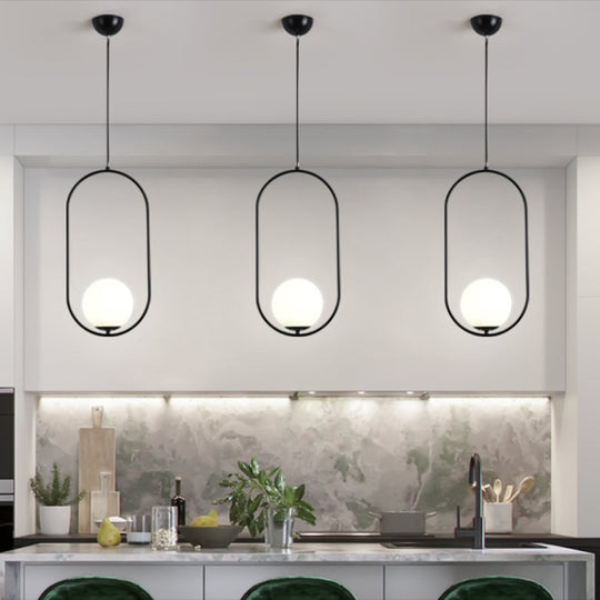 White Glass Pendant Light With Mid-Century Globe Design And Metal Ring