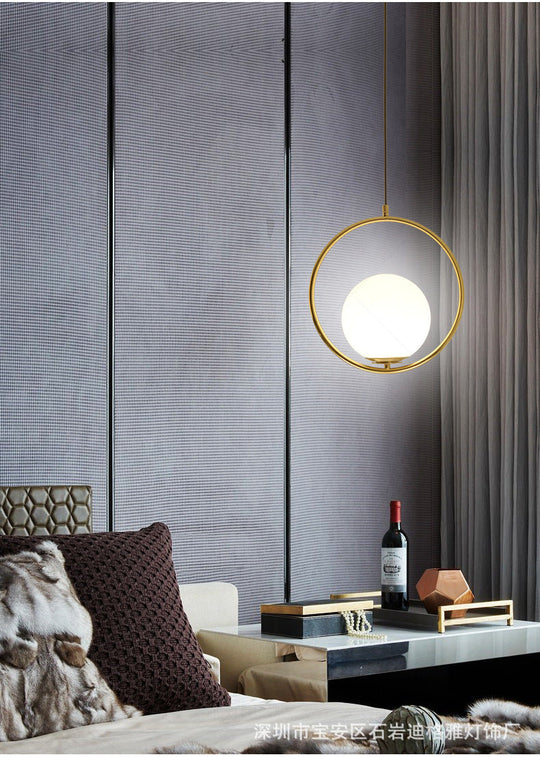 White Glass Pendant Light With Mid-Century Globe Design And Metal Ring