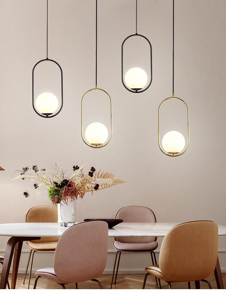 White Glass Pendant Light With Mid-Century Globe Design And Metal Ring