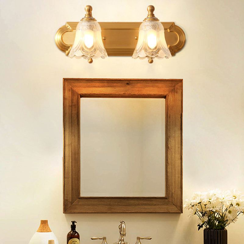 Brass Armed Wall Sconce With Ribbed Glass Shade For Bathroom Decoration