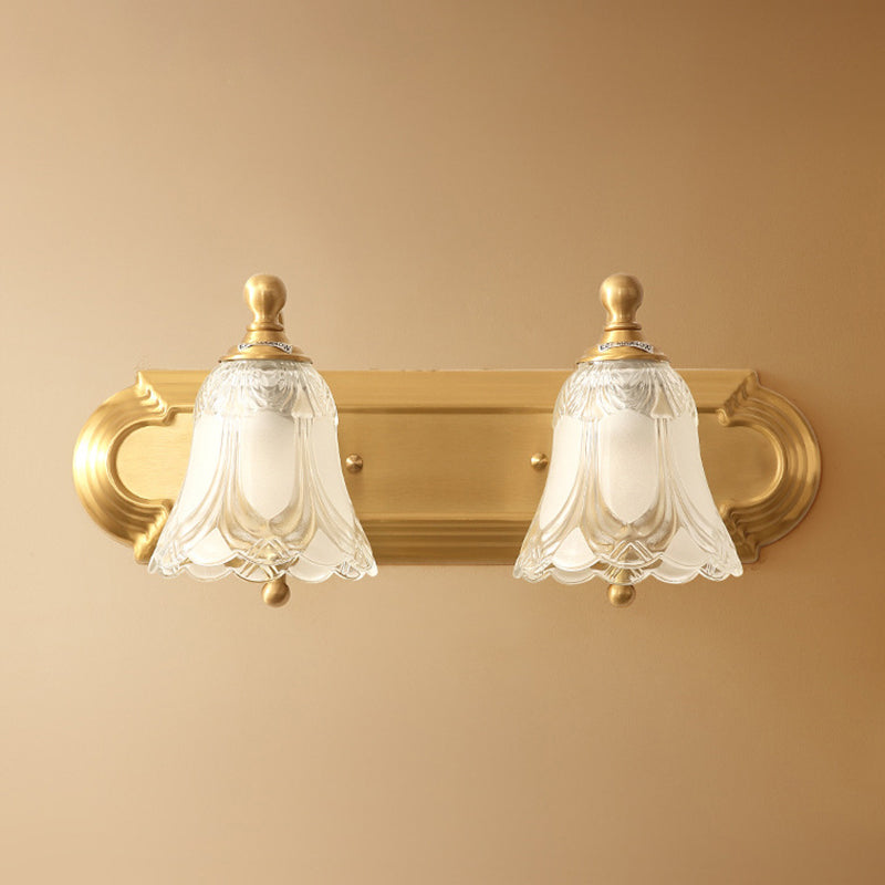 Brass Armed Wall Sconce With Ribbed Glass Shade For Bathroom Decoration