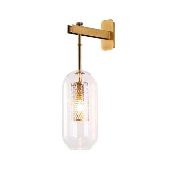 Modern 1-Light Clear Glass Tube Sconce - Brass Bedroom Wall Mount Lamp