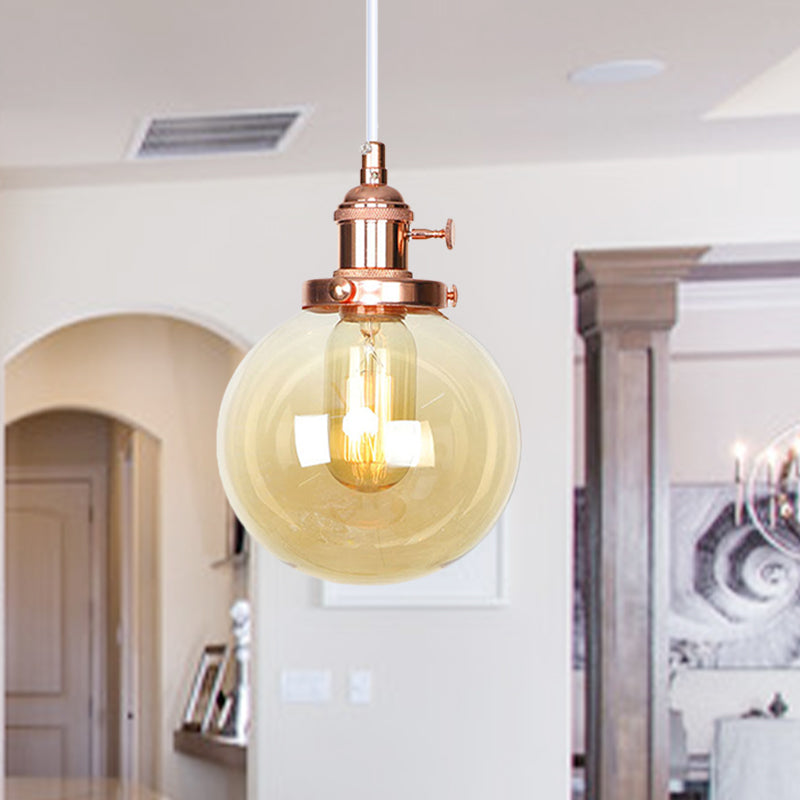 Farmhouse Orbit Pendant Light With Amber/Clear Glass And Adjustable Cord In 3 Elegant Finish