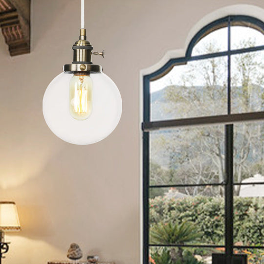 Farmhouse Orbit Pendant Light With Amber/Clear Glass And Adjustable Cord In 3 Elegant Finish Options