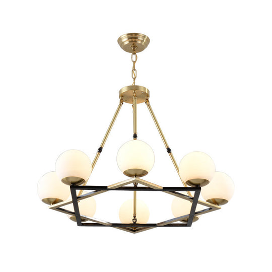 Postmodern Polygon Metal Chandelier With Brass Finish And Globe White Glass Shades