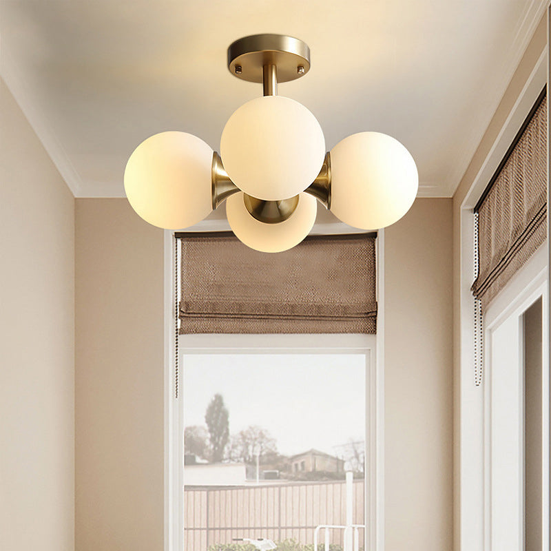 Contemporary Gold Ball Semi Flush Ceiling Light With 4 Milky Glass Heads