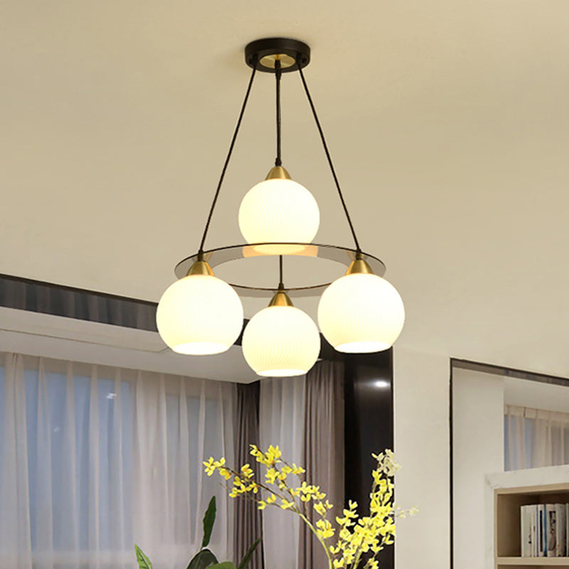 Contemporary 4-Head Black And Gold Chandelier Light With Opal Glass Shade