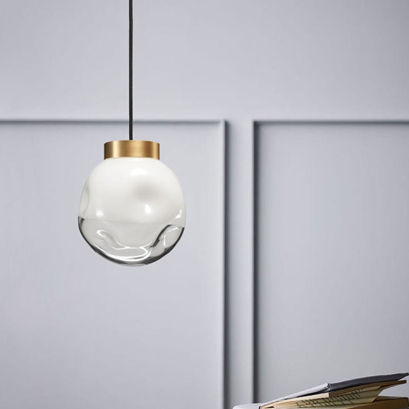 Modern Globe Pendant Light With Dimpled Glass In White And Clear Brass Finish
