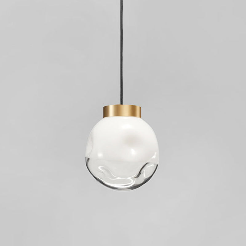 Modern Globe Pendant Light With Dimpled Glass In White And Clear Brass Finish