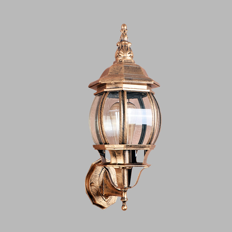 Country Outdoor Wall Light With Clear Glass Shade In Brass - 1 Bulb Fixture