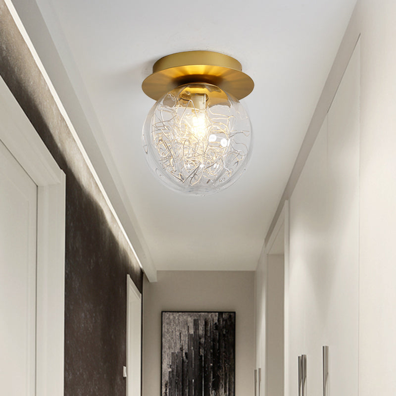 Modern Gold Pumpkin Ball Flush Light Fixture With Clear Glass Shade And Metal Line Inside