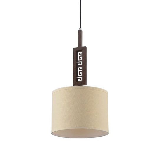 Modernist Brown Wood Hanging Lamp Kit With Carved Design Down Lighting And Drum Fabric Shade - 1