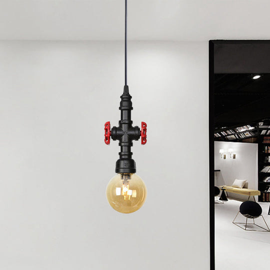 Industrial Black Finish Amber Glass Pendant Lamp With Pipe Suspension - 1-Light Ball/Capsule