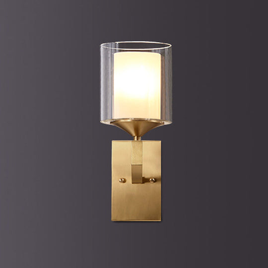 Colonial Style 2-Tier Wall Lamp With Cylindrical Glass Sconce - Brass Finish
