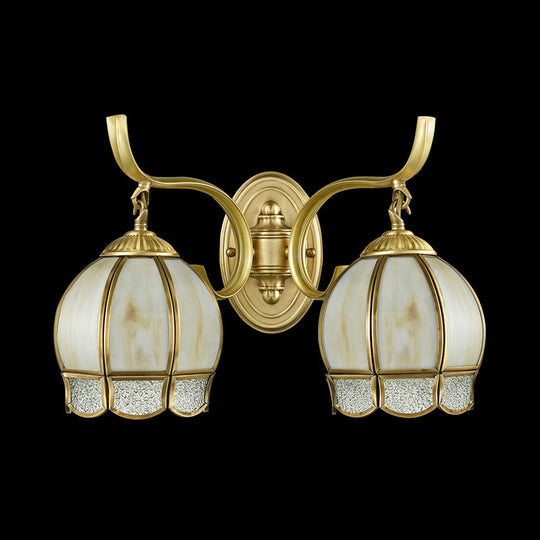 Traditional Tan Glass Brass Finish Sconce Light With Swirl Arm