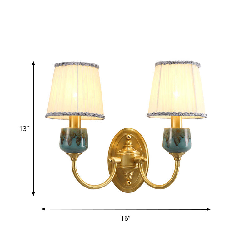 Brass Wall Hanging Light With Classic Swooping Arm And Fabric Shade