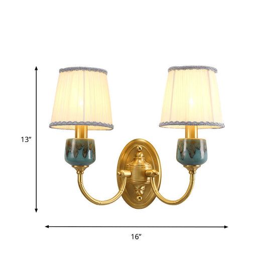Brass Wall Hanging Light With Classic Swooping Arm And Fabric Shade