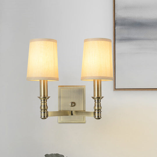 Country Corridor Wall Light Fixture With Brass Frame And Cylinder Fabric Shade