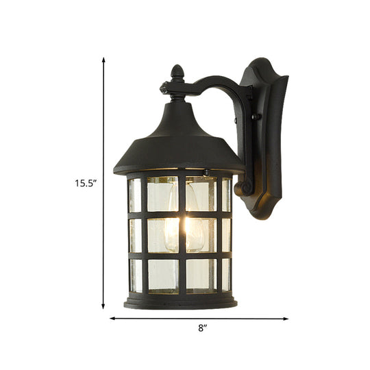Rustic Single Bulb Wall Sconce With Clear Glass & Metal Frame Ideal For Courtyards
