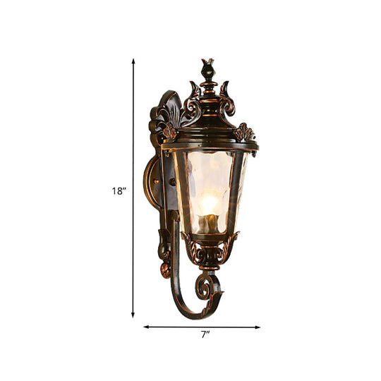 Clear Water Glass Outdoor Wall Sconce: Scrolled Arm 1-Light Black & Gold Lodge Lighting