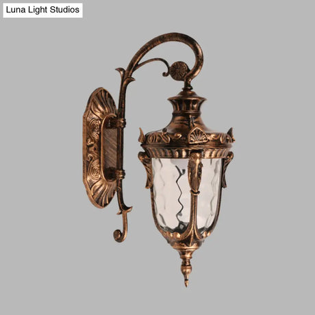 Acorn Glass Wall Sconce With Clear Water In Brass Finish