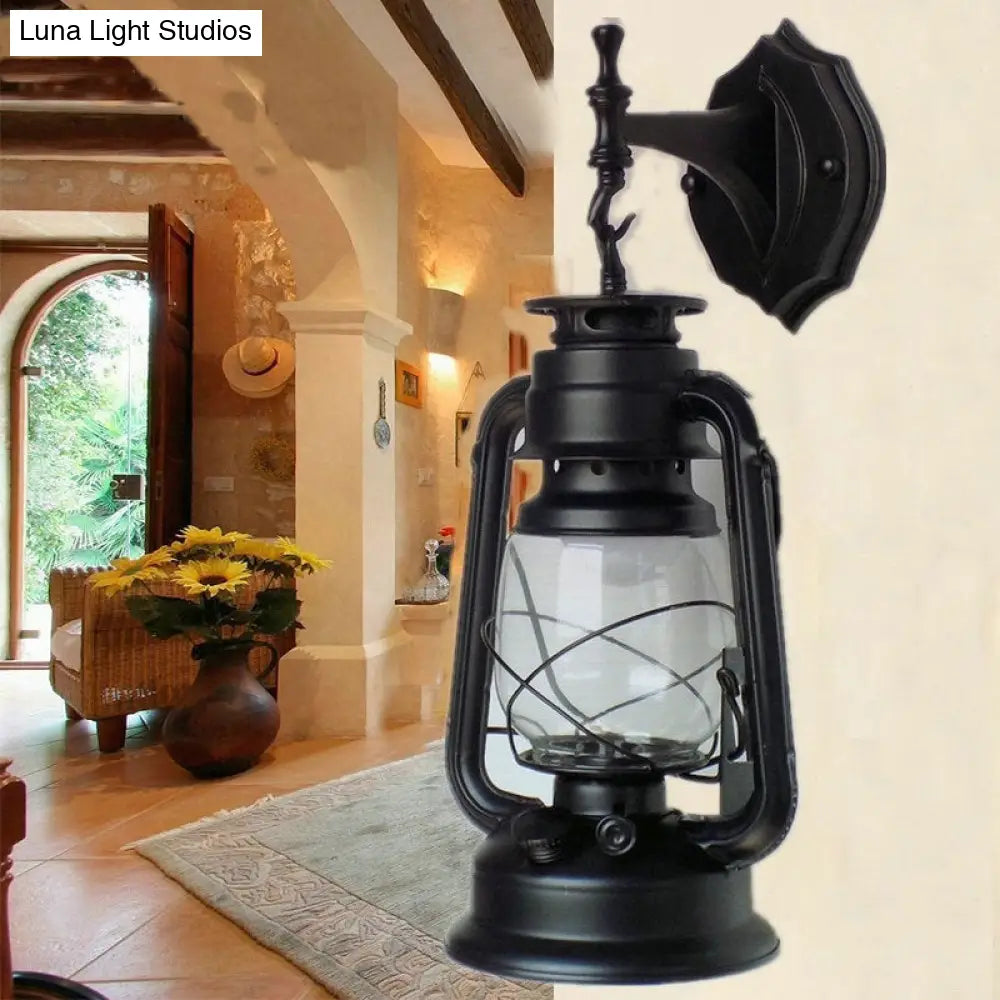 Antique Style Single-Bulb Oil Lantern Sconce: Clear Glass Wall Mount Light For Aisles Black /