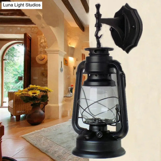 Antique Style Single-Bulb Oil Lantern Sconce: Clear Glass Wall Mount Light For Aisles Black /