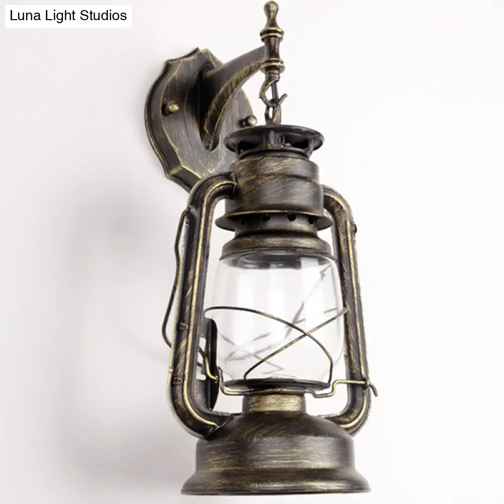 Antique Style Single-Bulb Oil Lantern Sconce: Clear Glass Wall Mount Light For Aisles Bronze /