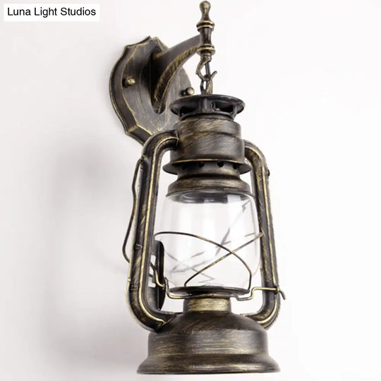 Antique Style Single-Bulb Oil Lantern Sconce: Clear Glass Wall Mount Light For Aisles Bronze /