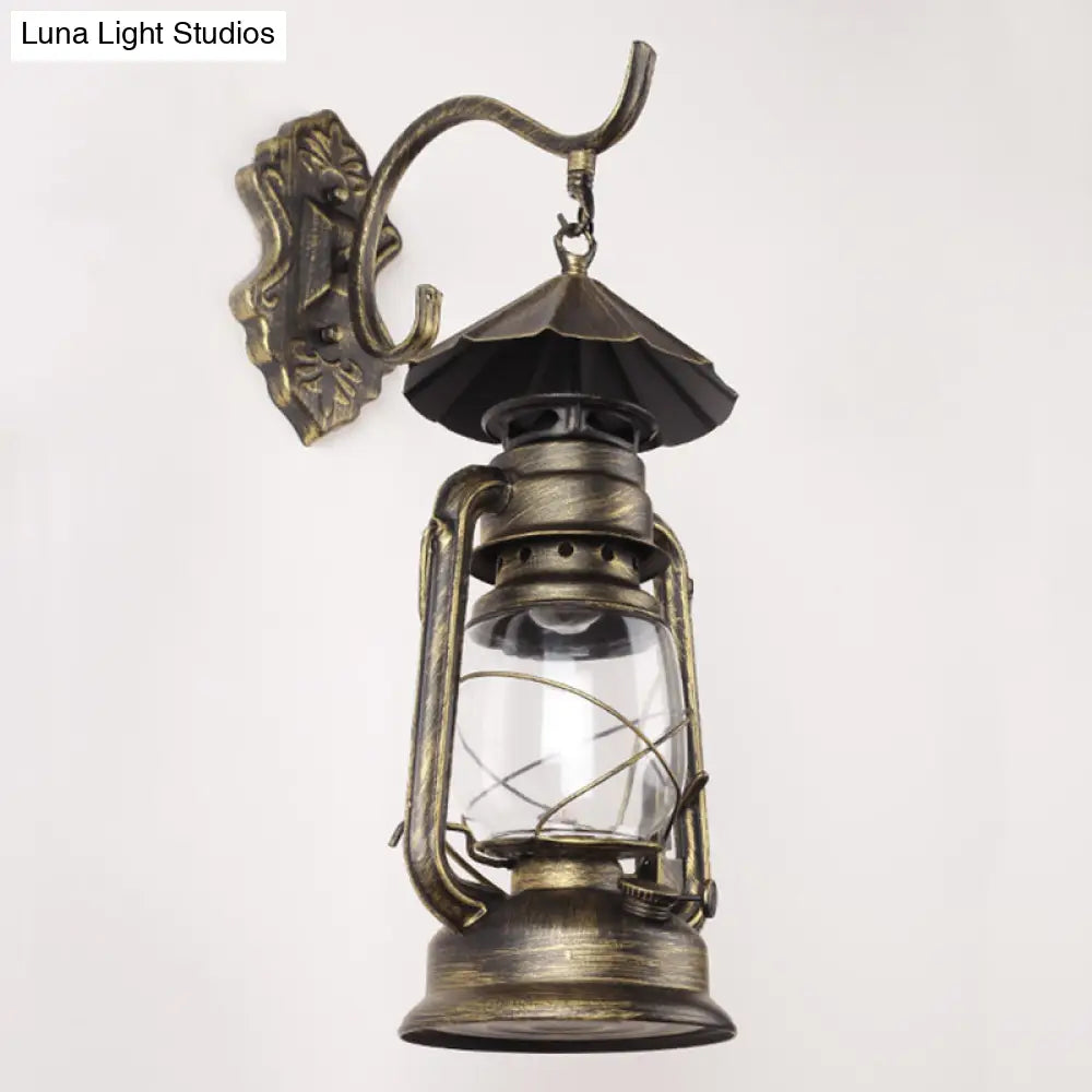 Antique Style Single-Bulb Oil Lantern Sconce: Clear Glass Wall Mount Light For Aisles Bronze /