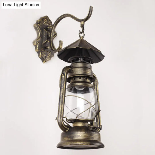 Antique Style Single-Bulb Oil Lantern Sconce: Clear Glass Wall Mount Light For Aisles Bronze /