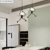 Art Deco Black Cartoon Person Suspension Pendant For Bedroom Lighting