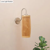 Asian Style Cylinder Bamboo And Metal Wall Lamp With Gooseneck Arm - 1 Bulb Beige Shade