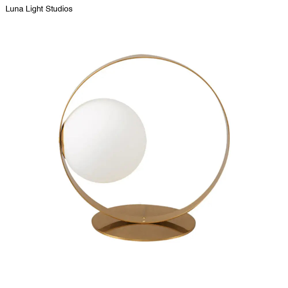 Gold Ring Table Lamp - Postmodern Iron Nightstand Light With Opaline Glass Shade