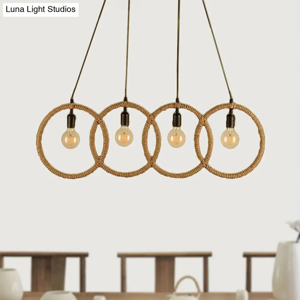 Black Finish Lodge Style Four-Ring Pendant Light With Manila Rope - 4 Lights For Coffee Shop