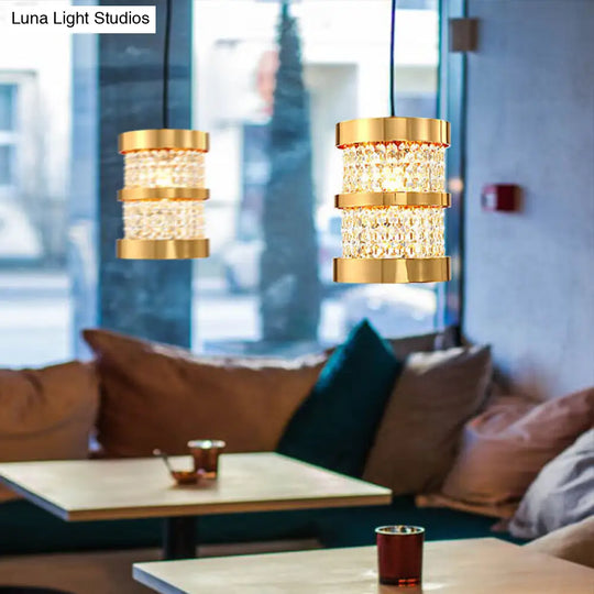 Modern Black/Gold Cylinder Pendant Light With Clear Crystal Beaded Strand - Stylish Metal 1-Bulb