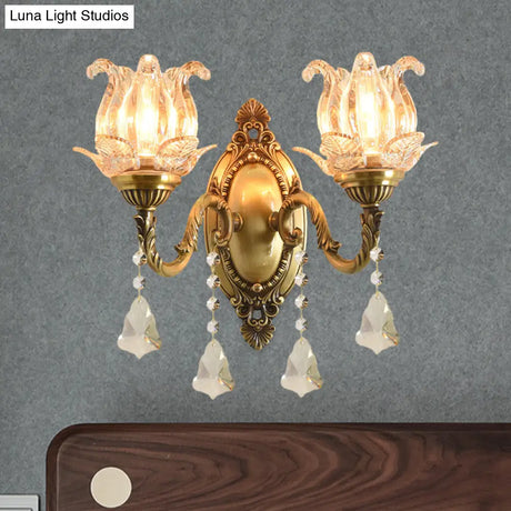 Brass Wall Mount Sconce With Clear Glass 1/2-Light For A Classic Floral Look
