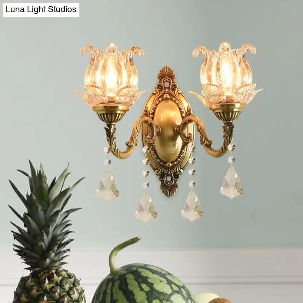 Brass Wall Mount Sconce With Clear Glass 1/2-Light For A Classic Floral Look