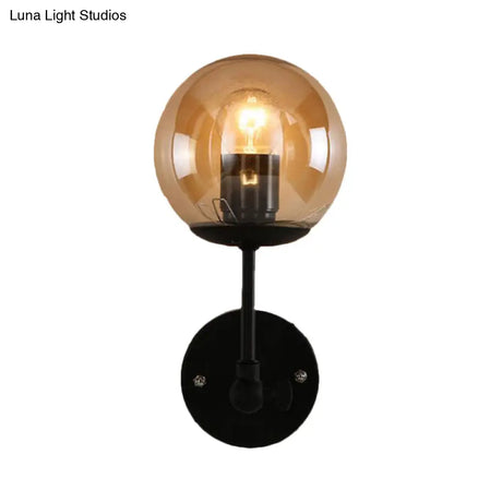Contemporary Black Wall Sconce With Globe Glass Shade