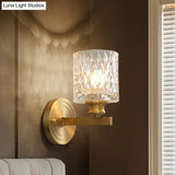 Contemporary Cylindrical Wall Light: Stylish Clear Dimpled Glass Design Golden Sconce For Bedroom