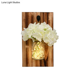 Contemporary Floral Wall Lamp With Beige/Orange/White String Light & Wood Backplate