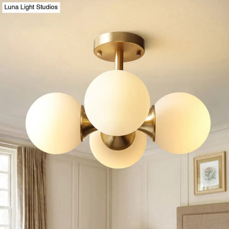 Contemporary Gold Ball Semi Flush Ceiling Light With 4 Milky Glass Heads